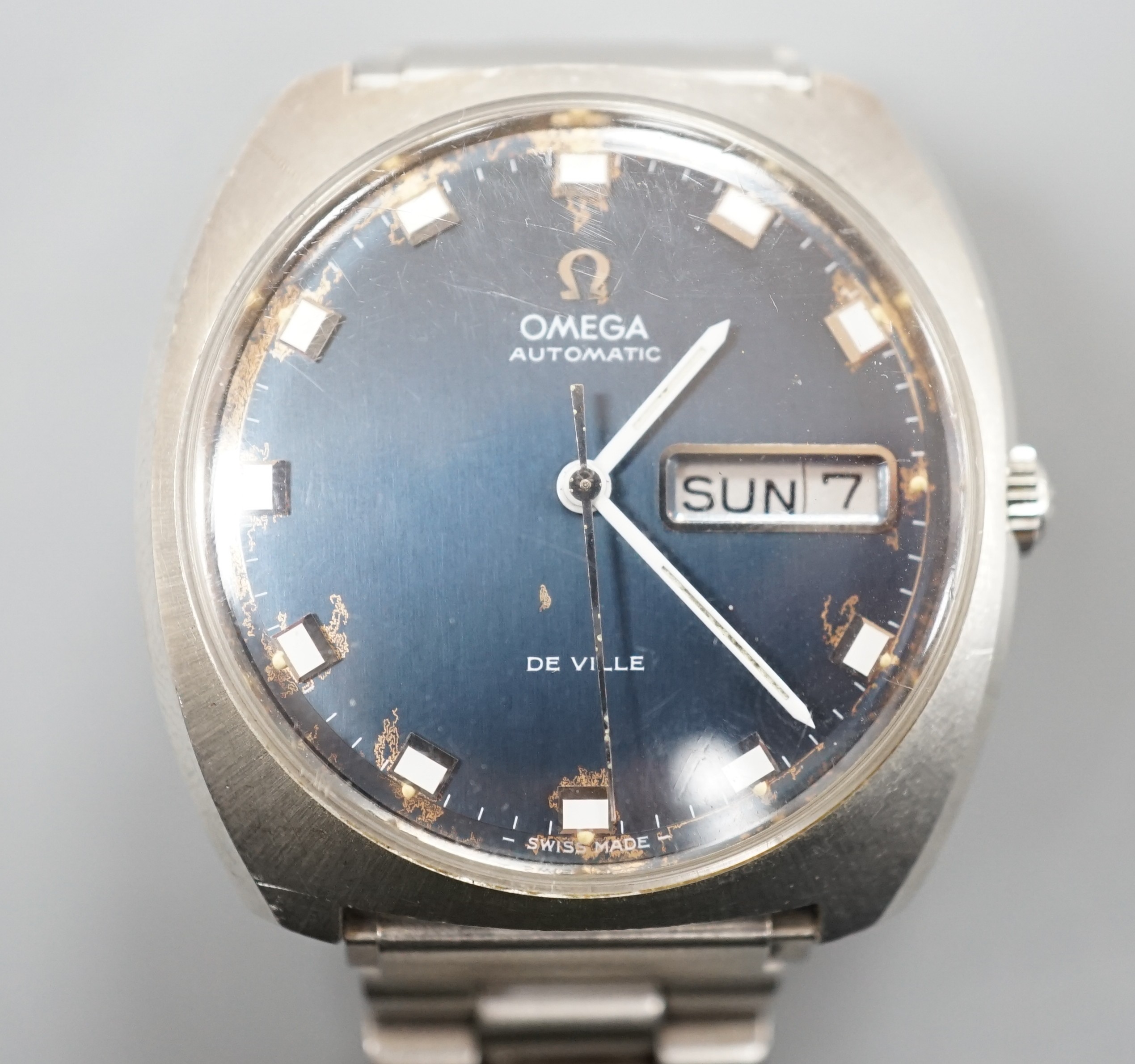 A gentleman's 1960's? stainless steel Omega De Ville automatic day date wrist watch, on associated steel bracelet, case diameter 36mm, no box or papers (dial a.f.).